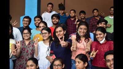 CBSE Class 12 students celebrate their results in Prayagraj on Friday. (HT Photo)