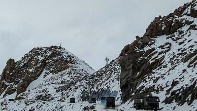 Army vehicles drive on a road near Chang La high mountain pass in Ladakh region near the border with China on June 17, 2020. (File photo) Army vehicles drive on a road near Chang La high mountain pass in Ladakh region near the border with China on June 17, 2020. (File photo)