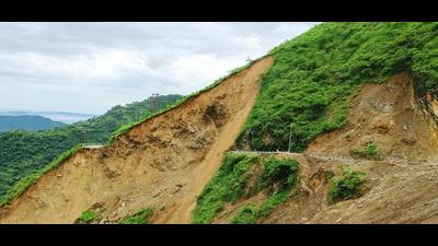 Commuters had a narrow escape when a stretch of national highway (NH) 707 was swept away in a landslide near Barwas in Kamrau tehsil of Sirmaur district on Friday. (HT Photo) Commuters had a narrow escape when a stretch of national highway (NH) 707 was swept away in a landslide near Barwas in Kamrau tehsil of Sirmaur district on Friday. (HT Photo)