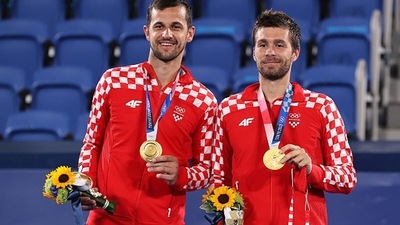Croatia's Nikola Mektic and Mate Pavic beat compatriots Marin Cilic and Ivan Dodig 6-4 3-6 10-6 in the Olympics men’s doubles final to win their country’s first ever gold medal in the sport. (Getty Images) Croatia's Nikola Mektic and Mate Pavic beat compatriots Marin Cilic and Ivan Dodig 6-4 3-6 10-6 in the Olympics men’s doubles final to win their country’s first ever gold medal in the sport. (Getty Images)