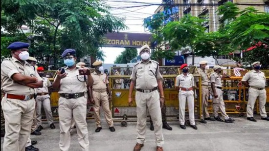 Assam security personnel stand vigil outside Mizoram House in Guwahati on Thursday. (ANI)