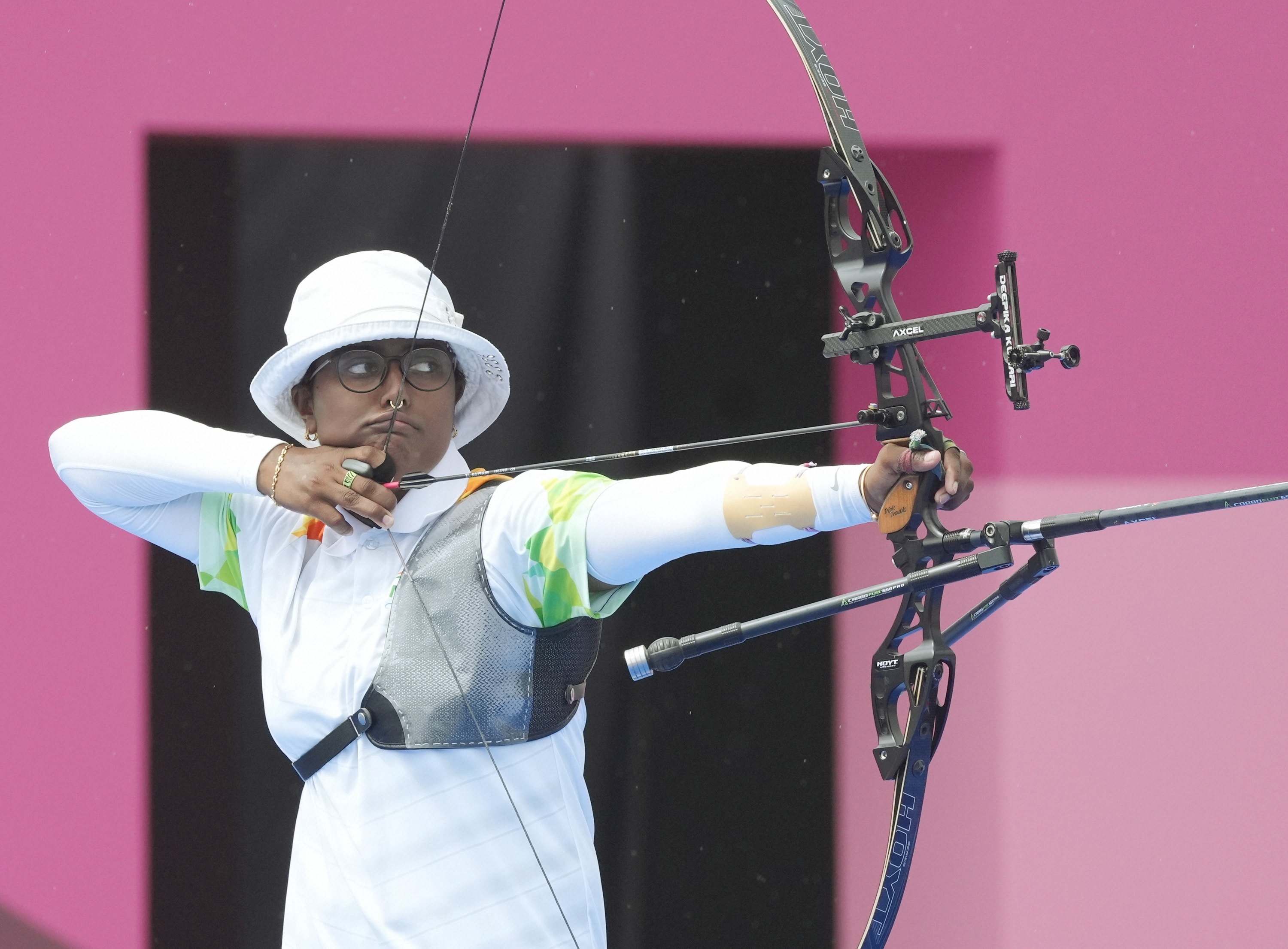 India's Deepika Kumari competes in the women's individual 1/8 eliminations round of the archery event, at the Summer Olympics 2020, in Tokyo.