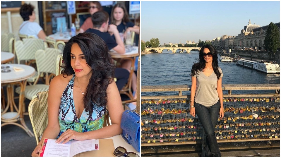 Mallika Sherawat posing for pictures in Paris.
