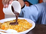 The image shows the biryani and chocolate dish being prepared.