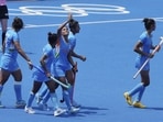 Vandana Katariya celebrates with teammates after scoring a goal against South Africa during a women's field hockey match at the 2020 Summer Olympics.