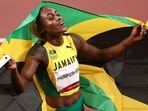 Elaine Thompson-Herah of Team Jamaica celebrates after winning the gold medal. 