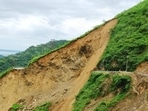 Commuters had a narrow escape when a stretch of national highway (NH) 707 was swept away in a landslide near Barwas in Kamrau tehsil of Sirmaur district on Friday. (HT Photo) Commuters had a narrow escape when a stretch of national highway (NH) 707 was swept away in a landslide near Barwas in Kamrau tehsil of Sirmaur district on Friday. (HT Photo)