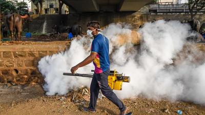 Fumigation drive in the riverbed area near Omkareshwar temple in Pune. (Sanket Wankhade/HT PHOTO) Fumigation drive in the riverbed area near Omkareshwar temple in Pune. (Sanket Wankhade/HT PHOTO)