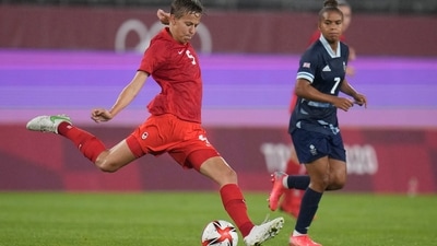 Canadian women's soccer player Quinn, 25, came out as nonbinary and transgender last year. Seen here (left), as they prepare to kick the ball during a women's soccer match against Great Britain at the 2020 Summer Olympics, Tuesday, July 27 in Kashima, Japan. (Fernando Vergara / AP) Canadian women's soccer player Quinn, 25, came out as nonbinary and transgender last year. Seen here (left), as they prepare to kick the ball during a women's soccer match against Great Britain at the 2020 Summer Olympics, Tuesday, July 27 in Kashima, Japan. (Fernando Vergara / AP)