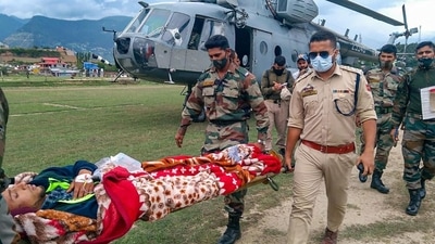 The search operation was interrupted by heavy rains late Thursday night and resumed around noon on Friday at Honzar village in Kishtwar district of Jammu and Kashmir. (PTI) The search operation was interrupted by heavy rains late Thursday night and resumed around noon on Friday at Honzar village in Kishtwar district of Jammu and Kashmir. (PTI)