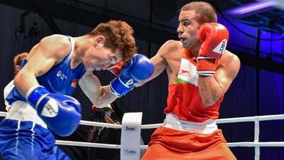 File photo of India's Amit Panghal (R), who was knocked out from Tokyo Olympics (PTI) File photo of India's Amit Panghal (R), who was knocked out from Tokyo Olympics (PTI)