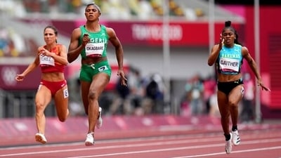 Blessing Okagbare, of Nigeria, wins a heat in the women's 100-meter run at the 2020 Summer Olympics, Friday, July 30, 2021, in Tokyo. (AP)