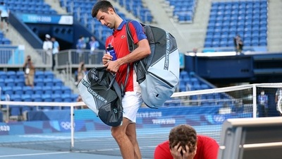 Novak Djokovic of Serbia exits the court after being defeated by Pablo Carreno Busta. (Getty Images) Novak Djokovic of Serbia exits the court after being defeated by Pablo Carreno Busta. (Getty Images)