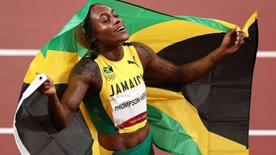 Elaine Thompson-Herah of Team Jamaica celebrates after winning the gold medal. (Getty Images) Elaine Thompson-Herah of Team Jamaica celebrates after winning the gold medal. (Getty Images)