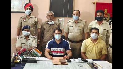 The accused in the police custody on Saturday. (HT Photo)