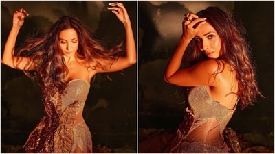 Malaika Arora in one-shoulder gold gown with thigh-baring slit is a fashion goddess (Instagram/@manekaharisinghani) Malaika Arora in one-shoulder gold gown with thigh-baring slit is a fashion goddess (Instagram/@manekaharisinghani)