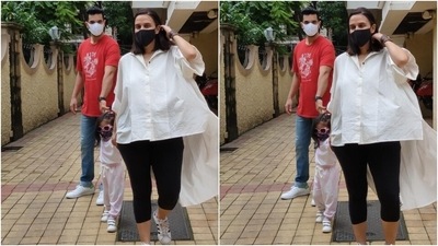 The mom-to-be teamed her day-out look with white and black lace-up sneakers, a leather bracelet, a black face mask and open side-parted locks. She flaunted her pregnancy glow with the look. (Varinder Chawla) The mom-to-be teamed her day-out look with white and black lace-up sneakers, a leather bracelet, a black face mask and open side-parted locks. She flaunted her pregnancy glow with the look. (Varinder Chawla)
