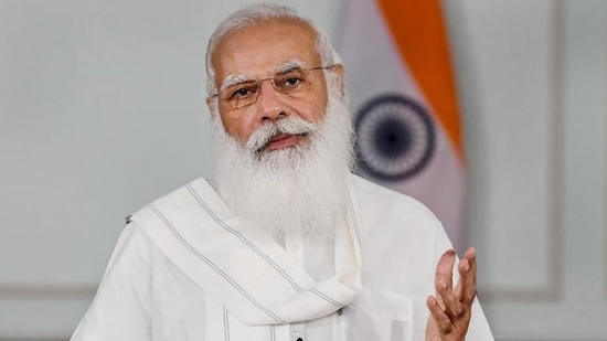 PM Modi advised a woman officer, who secured the first rank in training, that she should pay regular visits to local schools and interact with woman students.