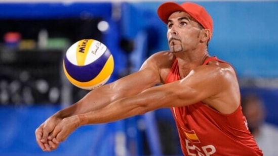 Pablo Herrera Allepuz, of Spain, competes during a men's beach volleyball match against Poland at the 2020 Summer Olympics, Saturday, July 31, 2021, in Tokyo, Japan. (AP Photo/Felipe Dana)(AP)