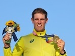 Tokyo 2020 Olympics - Sailing - Men's Laser - Medal Ceremony - Enoshima Yacht Harbour - Tokyo, Japan - August 1, 2021. Gold medallist Matthew Wearn of Australia celebrates on the podium. REUTERS/Carlos Barria