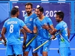 Dilpreet Singh of India celebrates with teammates after scoring. REUTERS/Bernadett Szabo