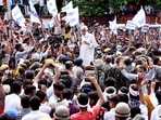In the wee hours on Sunday, Kirodi Meena, along with a dozen supporters, climbed up around 3km during heavy rainfall and placed the flag on a parapet of the fort located on hills near Galta on the Jaipur-Agra highway. (PTI Photo)