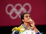 Bronze medalist Pusarla V. Sindhu celebrates during the medal ceremony for women's singles Badminton match at the 2020 Summer Olympics, Sunday, Aug. 1, 2021, in Tokyo, Japan. (AP Photo/Markus Schreiber)(AP)