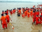 In this 2018 file photo, Kanwariyas take a dip in the river Ganga on the first day of the holy month of Shravan, at Vindhyachal Dham in Mirzapur. (PTI) In this 2018 file photo, Kanwariyas take a dip in the river Ganga on the first day of the holy month of Shravan, at Vindhyachal Dham in Mirzapur. (PTI)