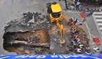Section of a road caved in under IIT Delhi flyover in New Delhi. (Raj K Raj / Hindustan Times) Section of a road caved in under IIT Delhi flyover in New Delhi. (Raj K Raj / Hindustan Times)