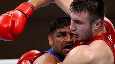 Tokyo 2020 Olympics - Boxing - Men's Super Heavyweight - Quarterfinal - KKG - Kokugikan Arena - Tokyo, Japan - August 1, 2021. Ashish Kumar of India in action against Bakhodir Jalolov of Uzbekistan REUTERS/Yara Nardi (REUTERS)