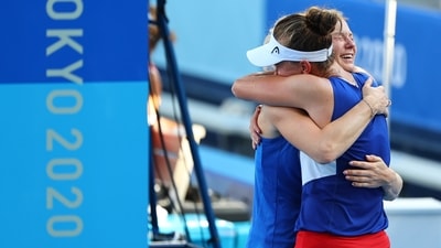 Tokyo 2020 Olympics - Tennis - Women's Doubles - Gold medal match - Ariake Tennis Park - Tokyo, Japan - August 1, 2021. Katerina Siniakova of Czech Republic and Barbora Krejcikova of Czech Republic react after winning their gold medal match against Viktorija Golubic of Switzerland and Belinda Bencic of Switzerland REUTERS/Mike Segar (REUTERS)