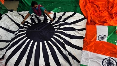 A worker gives finishing touches to the 60x90 feet tricolour at a Byculla workshop, in Mumbai, on July 30. (Photo by Satish Bate/Hindustan Times) (Satish Bate/HT PHOTO) A worker gives finishing touches to the 60x90 feet tricolour at a Byculla workshop, in Mumbai, on July 30. (Photo by Satish Bate/Hindustan Times) (Satish Bate/HT PHOTO)