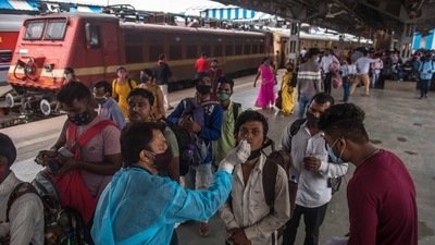 A health care worker collects swab samples of the passengers for the Covid-19 test at Lokmanya Tilak Terminus in Mumbai, India, on Saturday, July 31, 2021. (Pratik Chorge/HT Photo)
