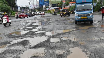 A road riddled with potholes in Pune. According to readers, poor maintenance of roads can cause fatal accidents. (HT PHOTO) A road riddled with potholes in Pune. According to readers, poor maintenance of roads can cause fatal accidents. (HT PHOTO)