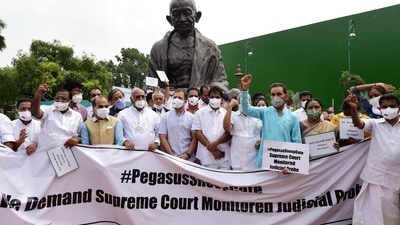 Congress leader Rahul Gandhi with other leaders at a protest over the Pegasus snooping row in New Delhi on July 23. (PTI Photo/Kamal Kishore) (PTI) Congress leader Rahul Gandhi with other leaders at a protest over the Pegasus snooping row in New Delhi on July 23. (PTI Photo/Kamal Kishore) (PTI)