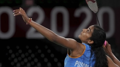Tokyo: India's Pusarla V. Sindhu plays a shot during her women's singles badminton bronze medal match against China's He Bingjiao, at the 2020 Summer Olympics, in Tokyo, Sunday, August 1, 2021. Sindhu won 21-13 21-15. (PTI Photo/Gurinder Osan)(PTI08_01_2021_000230B) (PTI) Tokyo: India's Pusarla V. Sindhu plays a shot during her women's singles badminton bronze medal match against China's He Bingjiao, at the 2020 Summer Olympics, in Tokyo, Sunday, August 1, 2021. Sindhu won 21-13 21-15. (PTI Photo/Gurinder Osan)(PTI08_01_2021_000230B) (PTI)