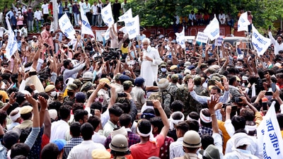 In the wee hours on Sunday, Kirodi Meena, along with a dozen supporters, climbed up around 3km during heavy rainfall and placed the flag on a parapet of the fort located on hills near Galta on the Jaipur-Agra highway. (PTI Photo) (PTI) In the wee hours on Sunday, Kirodi Meena, along with a dozen supporters, climbed up around 3km during heavy rainfall and placed the flag on a parapet of the fort located on hills near Galta on the Jaipur-Agra highway. (PTI Photo) (PTI)