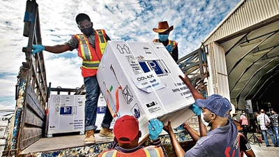 Boxes of Covid-19 vaccines, manufactured in India, arrive at the airport in Mogadishu, Somalia, in March. AP Boxes of Covid-19 vaccines, manufactured in India, arrive at the airport in Mogadishu, Somalia, in March. AP