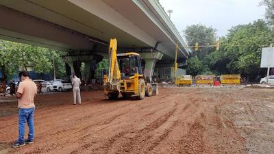 New Delhi, India- August 01, 2021: Construction work underway at IIT flyover after a section of the road had caved in following heavy rains, in Hauz Khaz, New Delhi, on Sunday, August 1, 2021. (HT Photo) New Delhi, India- August 01, 2021: Construction work underway at IIT flyover after a section of the road had caved in following heavy rains, in Hauz Khaz, New Delhi, on Sunday, August 1, 2021. (HT Photo)