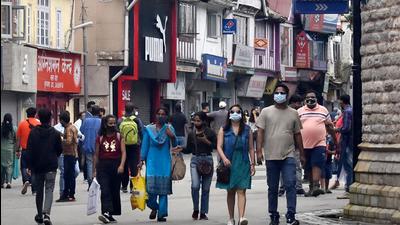 Locals and tourists strolling on the Mall Road in Shimla on Sunday. (Deepak Sansta/HT) Locals and tourists strolling on the Mall Road in Shimla on Sunday. (Deepak Sansta/HT)
