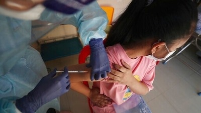 A nurse gives a shot of Sinovac's COVID-19 vaccine to a young girl at the Phnom Penh Thmey Health Center in Phnom Penh, Cambodia, Sunday, Aug. 1, 2021. (Representational) (AP) A nurse gives a shot of Sinovac's COVID-19 vaccine to a young girl at the Phnom Penh Thmey Health Center in Phnom Penh, Cambodia, Sunday, Aug. 1, 2021. (Representational) (AP)