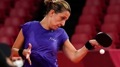 Elizabeta Samara of Romania eyes the ball during table tennis women's team round of 16 against Farah Abdelaziz of Egypt at the 2020 Summer Olympics, Sunday, Aug. 1, 2021, in Tokyo, Japan. (AP Photo/Vincent Thian) (AP) Elizabeta Samara of Romania eyes the ball during table tennis women's team round of 16 against Farah Abdelaziz of Egypt at the 2020 Summer Olympics, Sunday, Aug. 1, 2021, in Tokyo, Japan. (AP Photo/Vincent Thian) (AP)