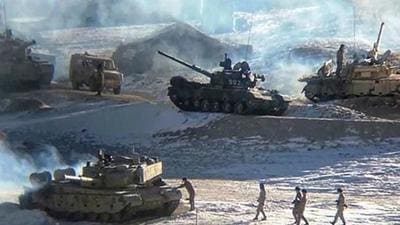 This undated handout photograph released by the Indian Army on February 16, 2021, shows People’s Liberation Army (PLA) soldiers and tanks during military disengagement along the Line of Actual Control (LAC) at the India-China border in Ladakh. (Photo by MINISTRY OF DEFENCE)