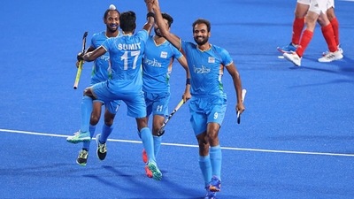 Gurjant Singh of India celebrates with teammates Sumit, Hardik Singh and Shamsher Singh after scoring the team's second goal. (Getty Images) Gurjant Singh of India celebrates with teammates Sumit, Hardik Singh and Shamsher Singh after scoring the team's second goal. (Getty Images)