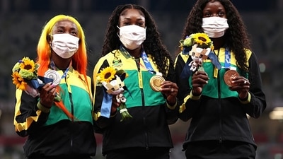 From Left: Silver medalist Shelly-Ann Fraser-Pryce, gold medalist Elaine Thompson-Herah and bronze medalist Shericka Jackson of Team Jamaica. (Getty Images) From Left: Silver medalist Shelly-Ann Fraser-Pryce, gold medalist Elaine Thompson-Herah and bronze medalist Shericka Jackson of Team Jamaica. (Getty Images)