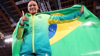 Rebeca Andrade of Team Brazil celebrates winning gold in the Women's Vault Final. (Getty Images) Rebeca Andrade of Team Brazil celebrates winning gold in the Women's Vault Final. (Getty Images)
