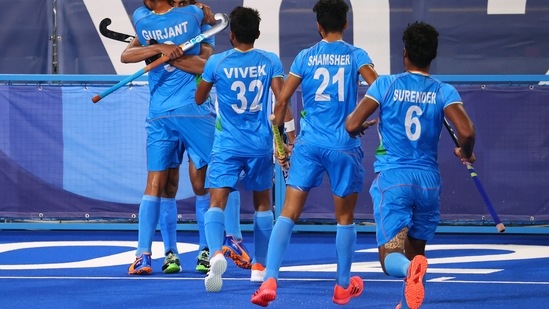 Tokyo 2020 Olympics - Hockey - Men - Quarterfinal - India v Britain - Oi Hockey Stadium, Tokyo, Japan - August 1, 2021. Hardik Singh of India celebrates with teammates after scoring. REUTERS/Bernadett Szabo(REUTERS)