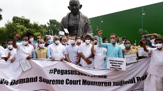 Congress leader Rahul Gandhi with other leaders at a protest over the Pegasus snooping row in New Delhi on July 23. (PTI Photo/Kamal Kishore)(PTI)