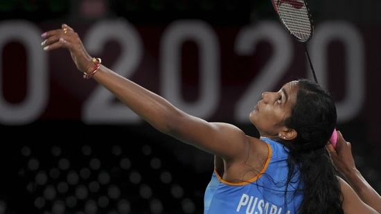 Tokyo: India's Pusarla V. Sindhu plays a shot during her women's singles badminton bronze medal match against China's He Bingjiao, at the 2020 Summer Olympics, in Tokyo, Sunday, August 1, 2021. Sindhu won 21-13 21-15. (PTI Photo/Gurinder Osan)(PTI08_01_2021_000230B)(PTI)