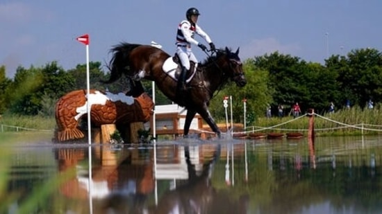 Thailand's Weerapat Pitakanonda, riding Carnival March, competes during the equestrian eventing cross county competition at the Sea Forest Cross-Country Course in Tokyo at the 2020 Summer Olympics, Sunday, Aug. 1, 2021, in Tokyo, Japan. (AP Photo/Carolyn Kaster)(AP)